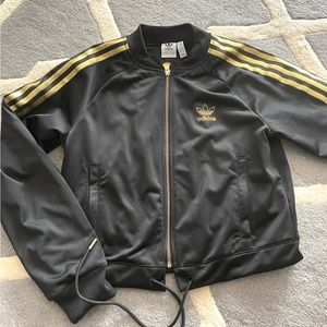 Adidas SST Superstar Track Jacket 2.0
Gold and black